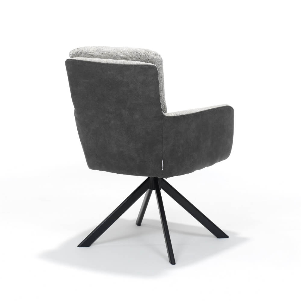 Achteraanzicht van de RV Design Fred armstoel in ecru retro bliss stof met zwarte metalen draaivoet.