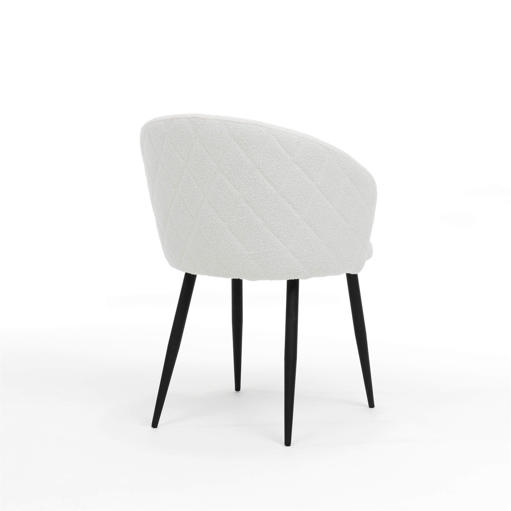 Achteraanzicht van de RV Design Kelly stoel in ivoor teddy stof met zwart metalen onderstel.