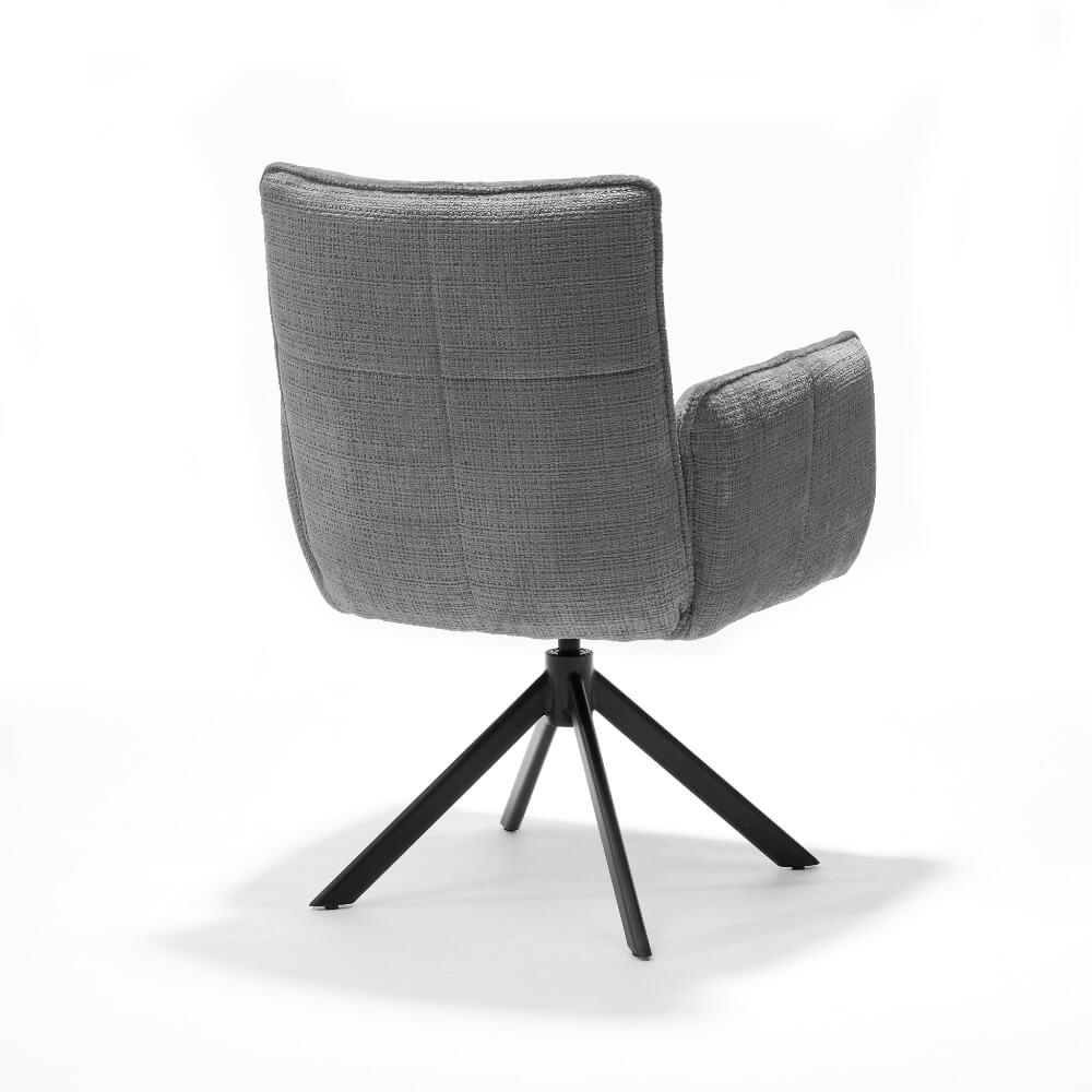 Achteraanzicht van de RV Design Nova armstoel in lichtgrijze Cremona stof met zwarte metalen draaivoet.