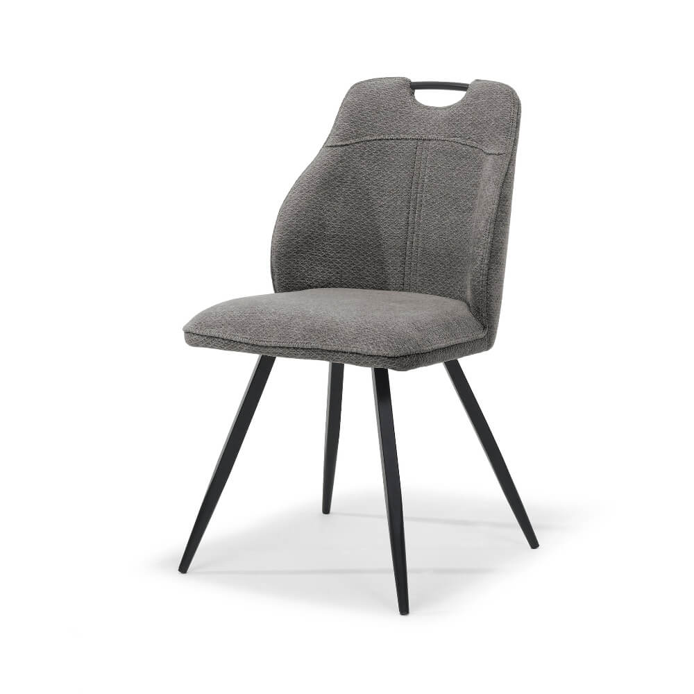 RV Design Adele eetkamerstoel in antraciet Retro Bliss stof met ergonomische rugleuning en zwarte metalen poten, zijaanzicht op witte achtergrond.