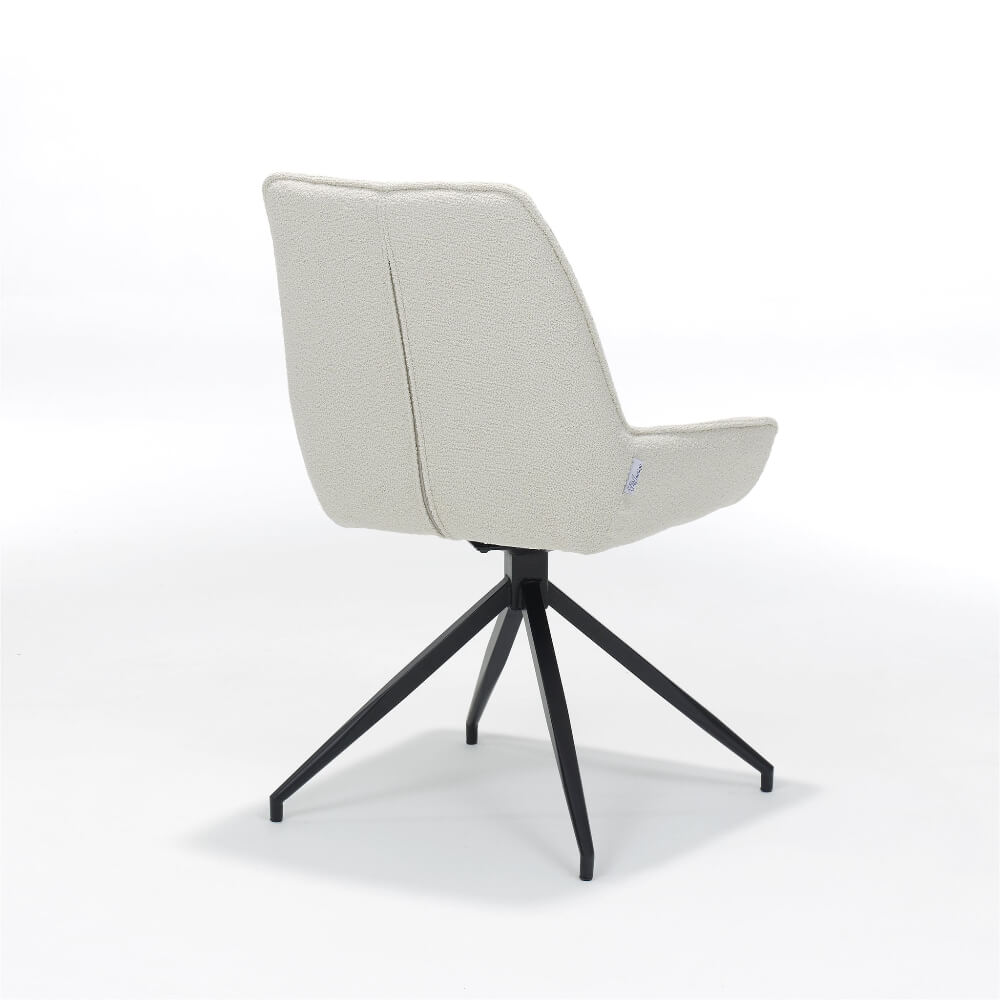 Achteraanzicht van RV Design Montana stoel met teddy bekleding in ecru en zwart metalen draaivoet.